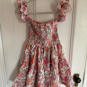 Smocked mini dress with tiered skirt